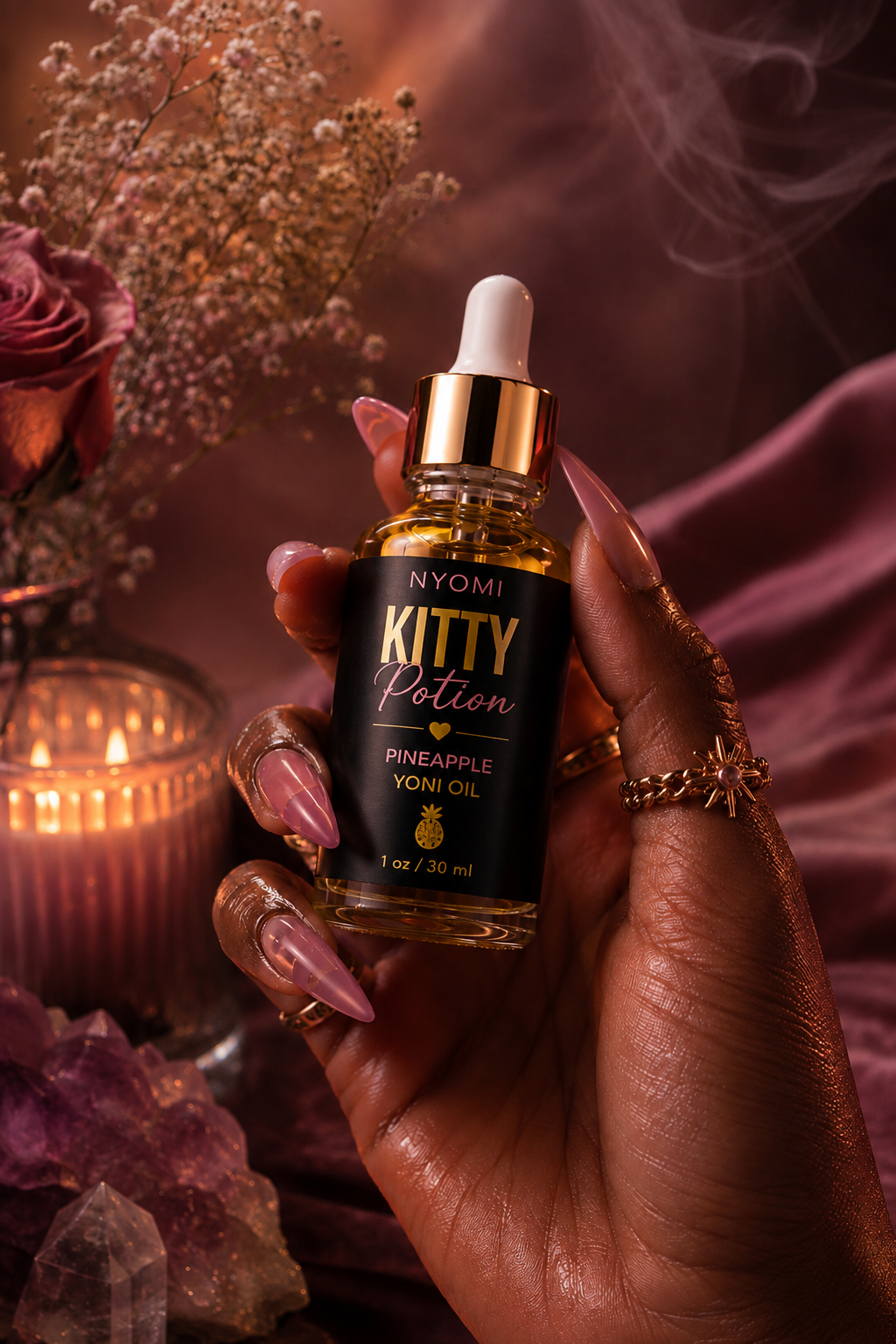 NYOMI Kitty Potion held in hand